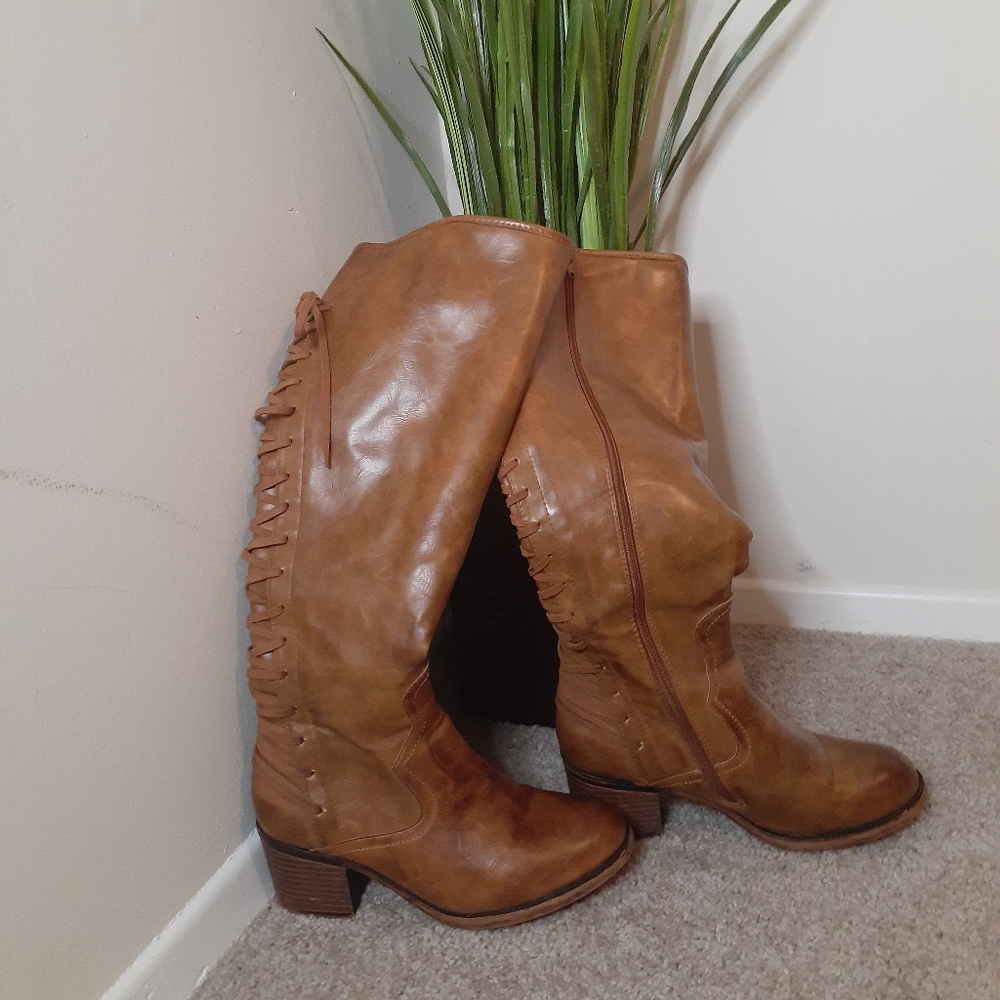 Camel color knee high boots with lace up the back